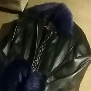 black leather jacket with purple fir